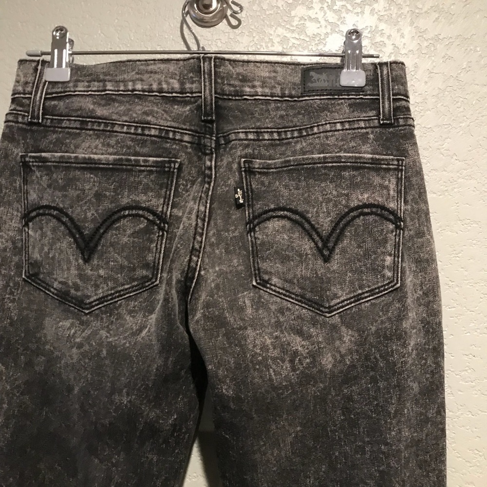 Levi’s 524 skinny acid wash jeans